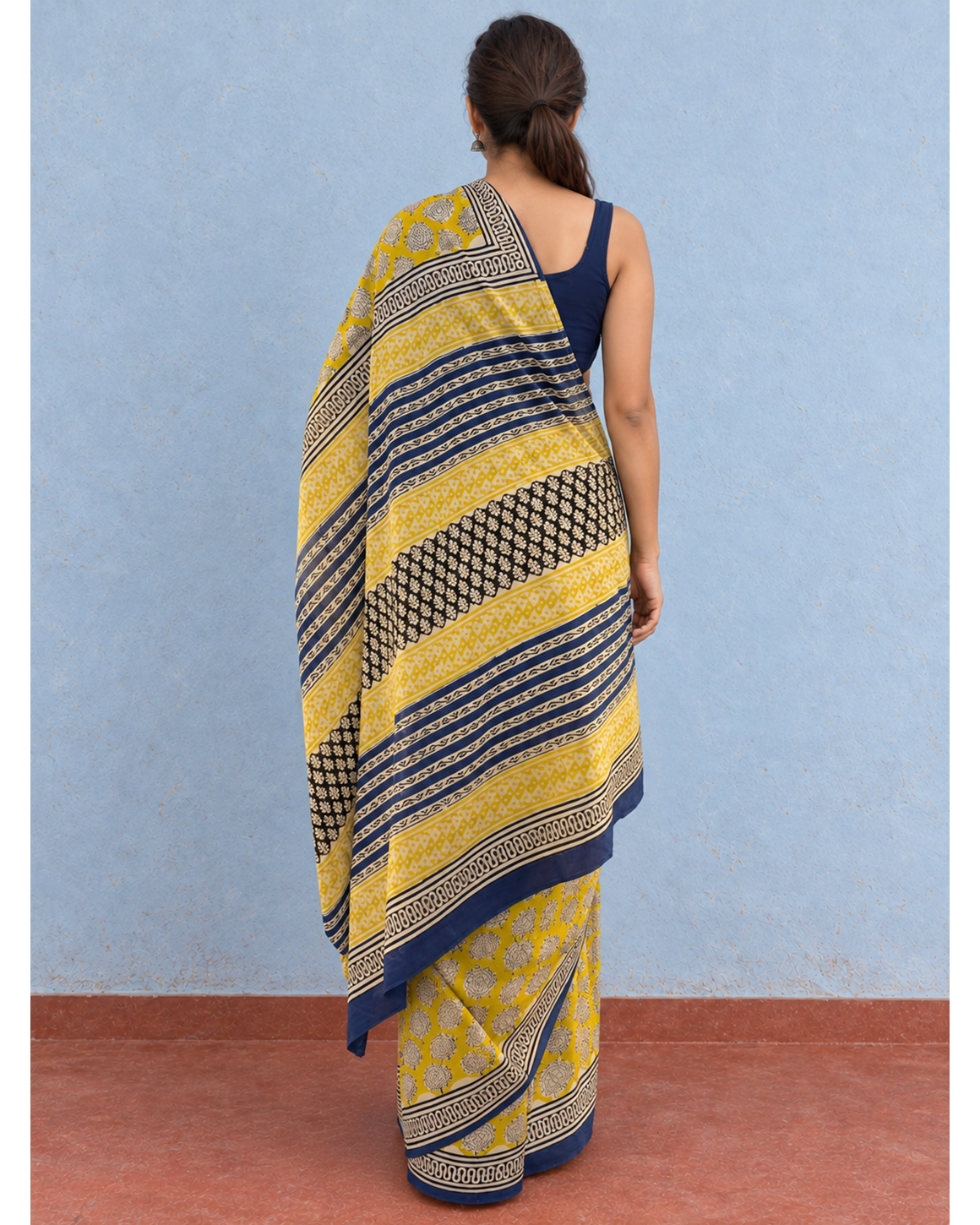 Amaltas mustard-yellow and navy mulmul saree, rear pallu