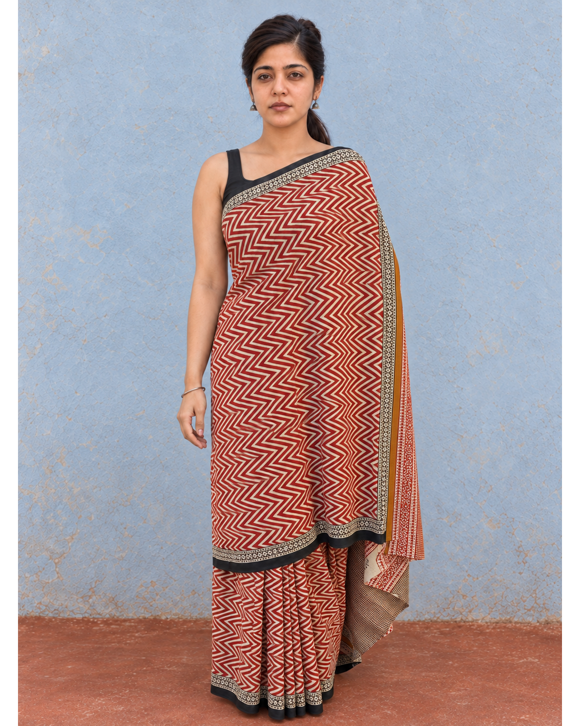 Tarang rust and cream zigzag mulmul saree, open drape