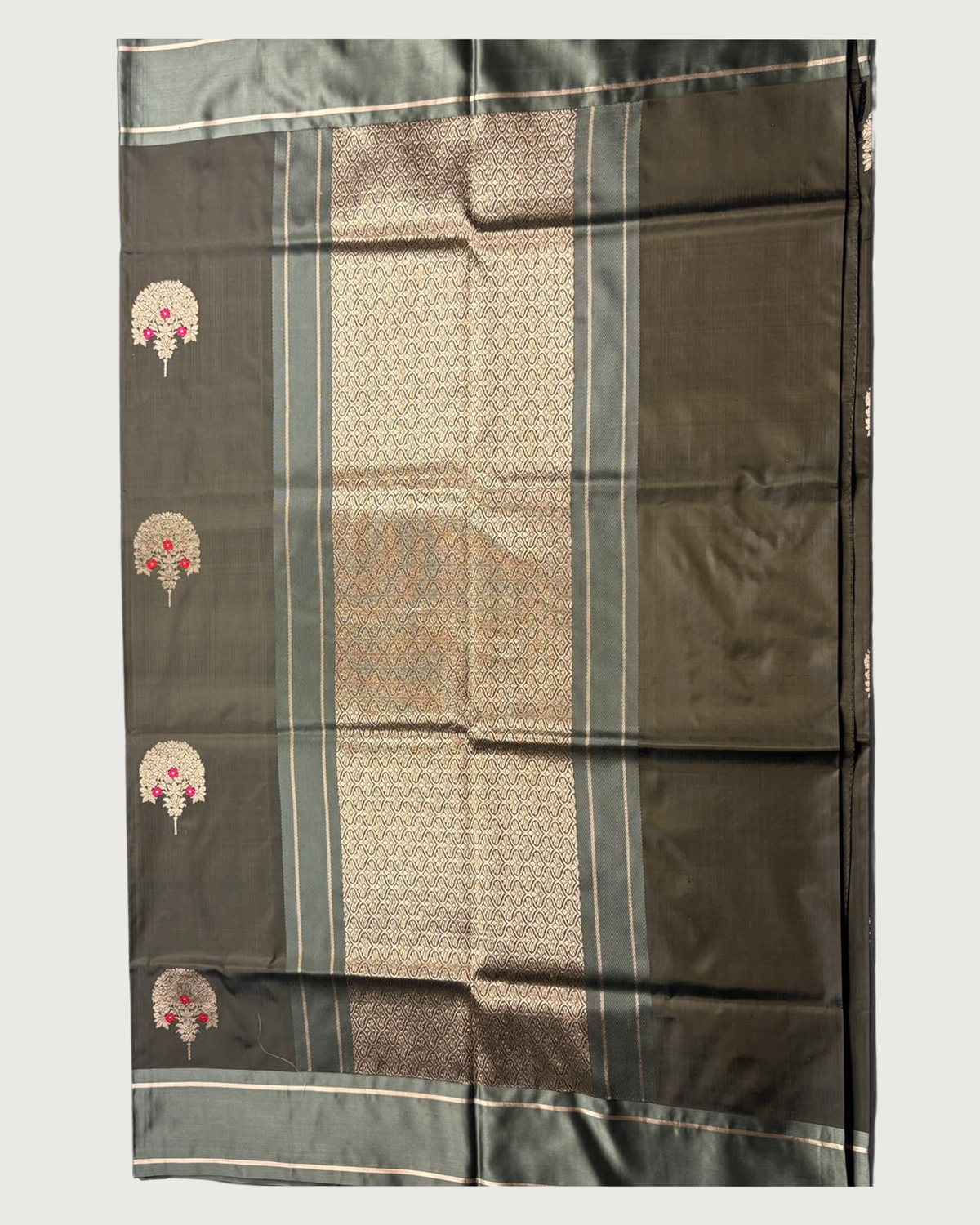 Zaitoon saree flat view showing woven gold pallu